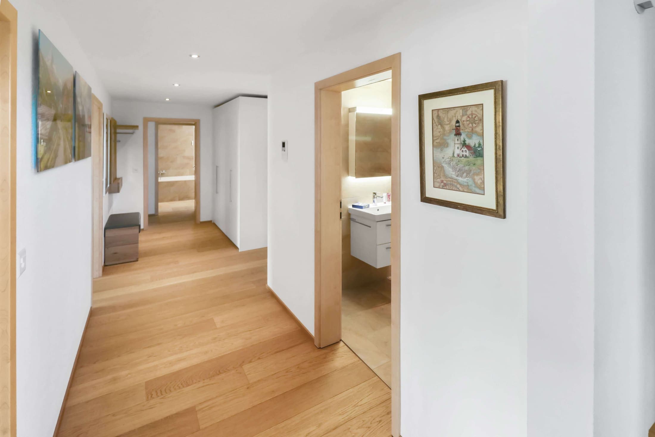 Bright hallway with wood flooring